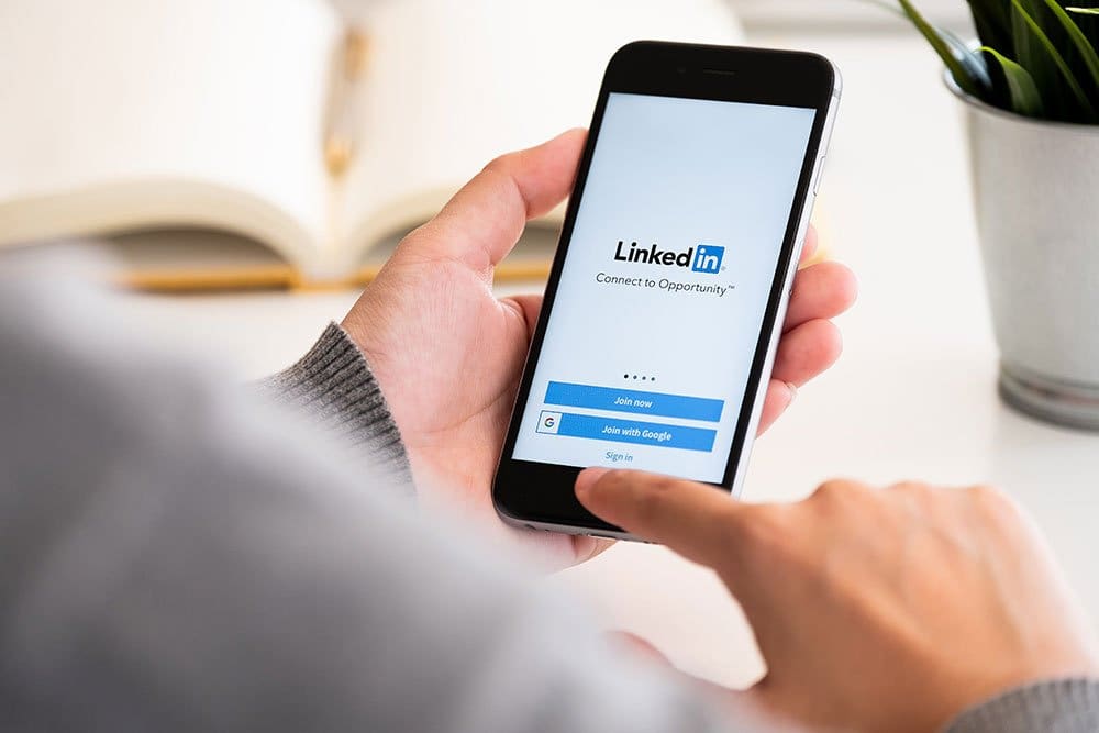 B2B marketing example with LinkedIn on phone