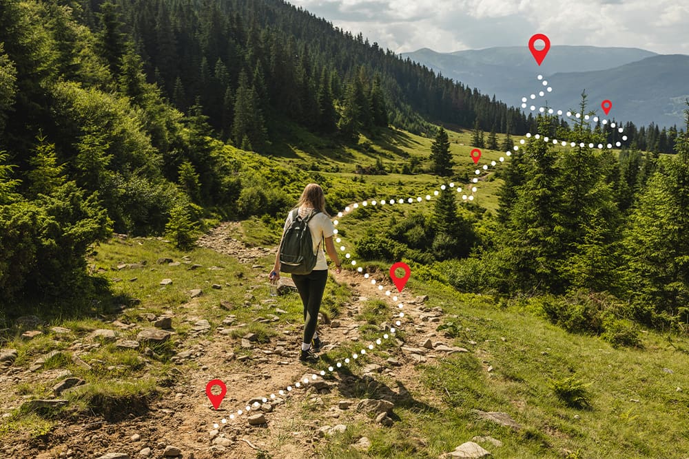 brand strategy road map, woman hiking on hilly trail
