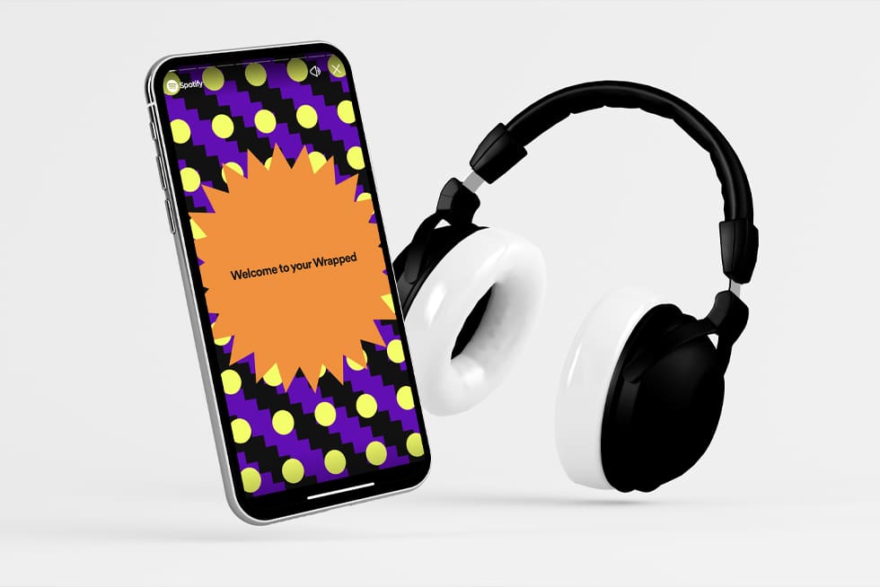 content marketing strategies, example with Spotify wrapped on iPhone and headphones