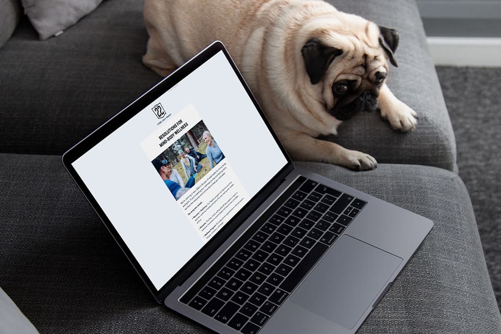 email marketing example on laptop with dog next to it